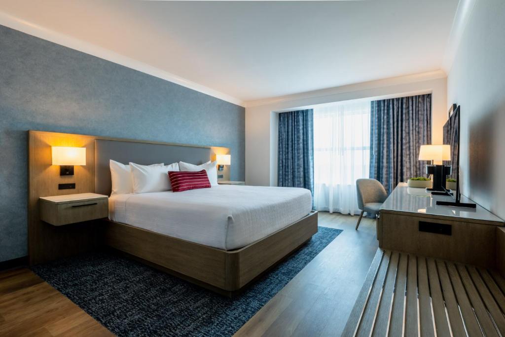 a hotel room with a bed and a television at Miccosukee Casino & Resort in Miami