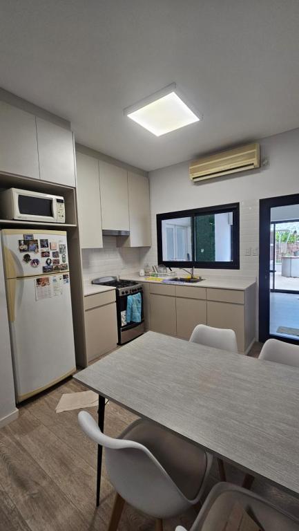 Departamento, con cochera y patio