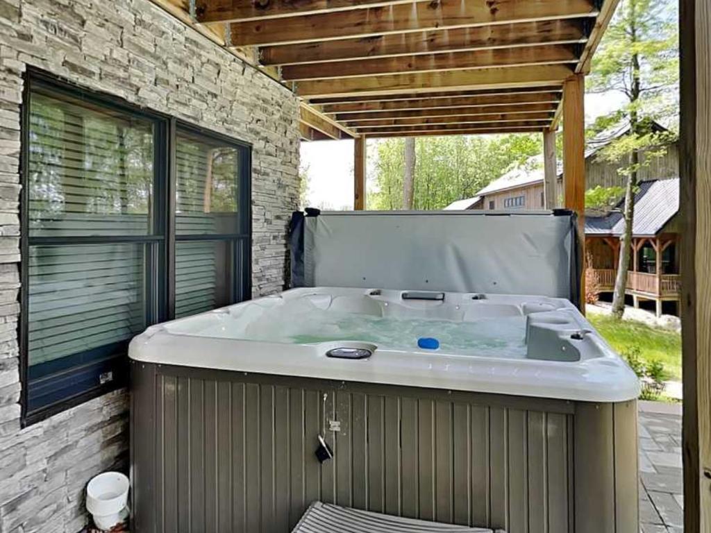 a jacuzzi tub sitting on a patio at Space Mountain in McHenry