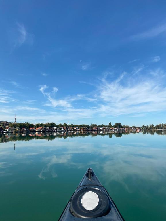 a view from the inside of a kayak on a lake at RestOnTheLake in Esztergom