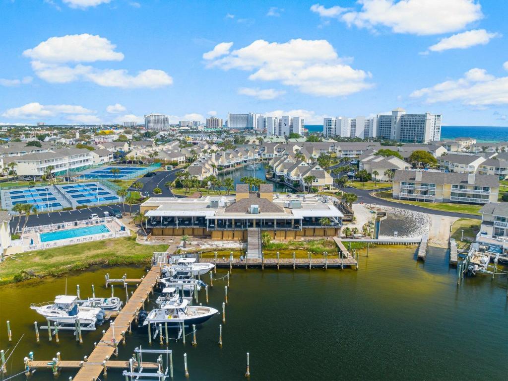 an aerial view of a marina with boats in the water at Sandpiper Cove by Panhandle Getaways in Destin