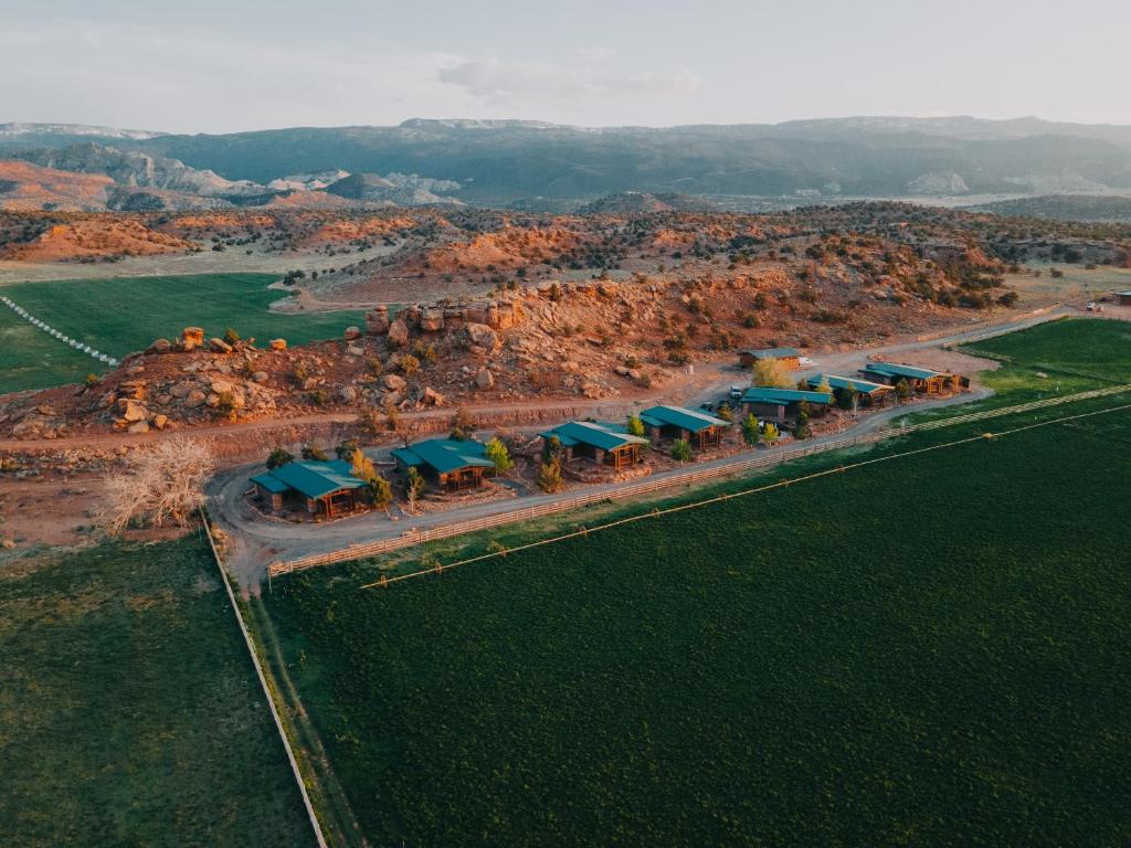 an aerial view of a resort with blue roofs at Cougar Ridge Resort in Torrey