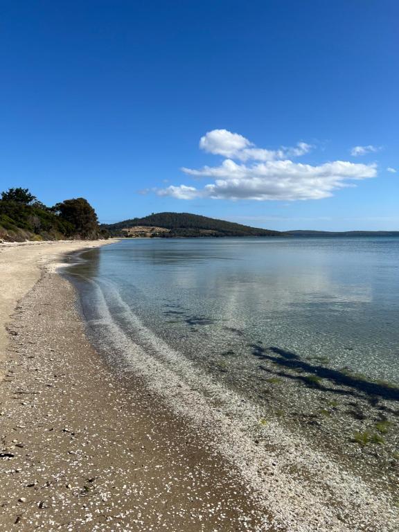 a view of a beach with the water at Bruny Seaview Escape in Alonnah