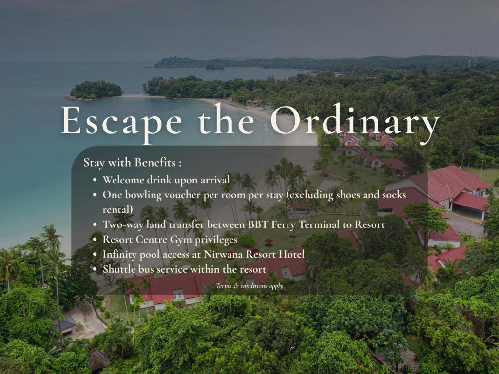 a sign for a resort in the jungle at Mayang Sari Beach Resort in Lagoi