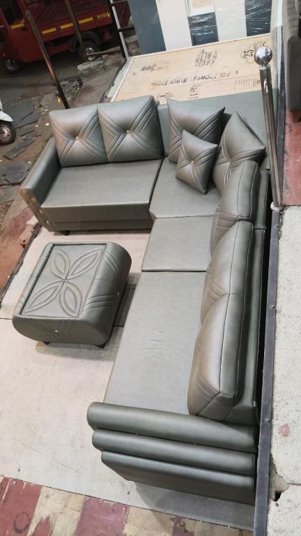 a group of beds with pillows on a sidewalk at Sai Villa Appartment S202 in Nagpur