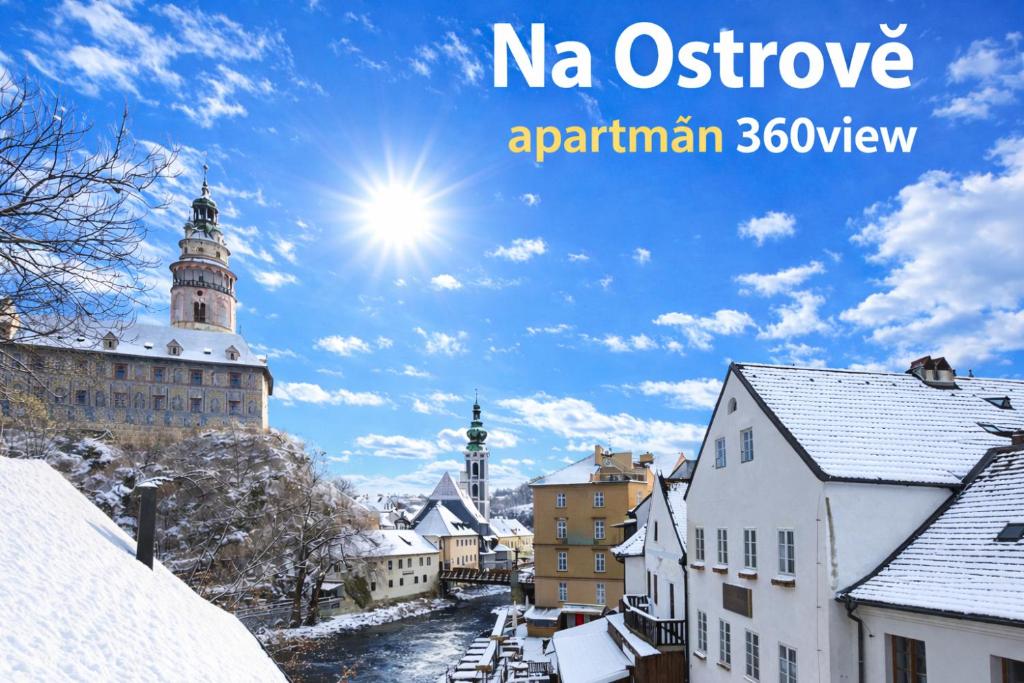 a city in the snow with the words nara osijekarma view at Penzion na Ostrově in Český Krumlov