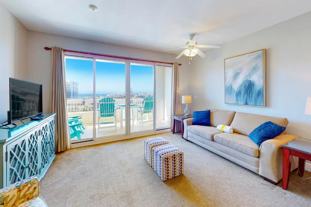 Fifth-floor condo with furnished balcony beach access & views shared pool & gym