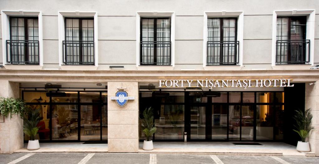 a front view of a building with a store at Forty Nişantaşı Hotel & SPA in Istanbul