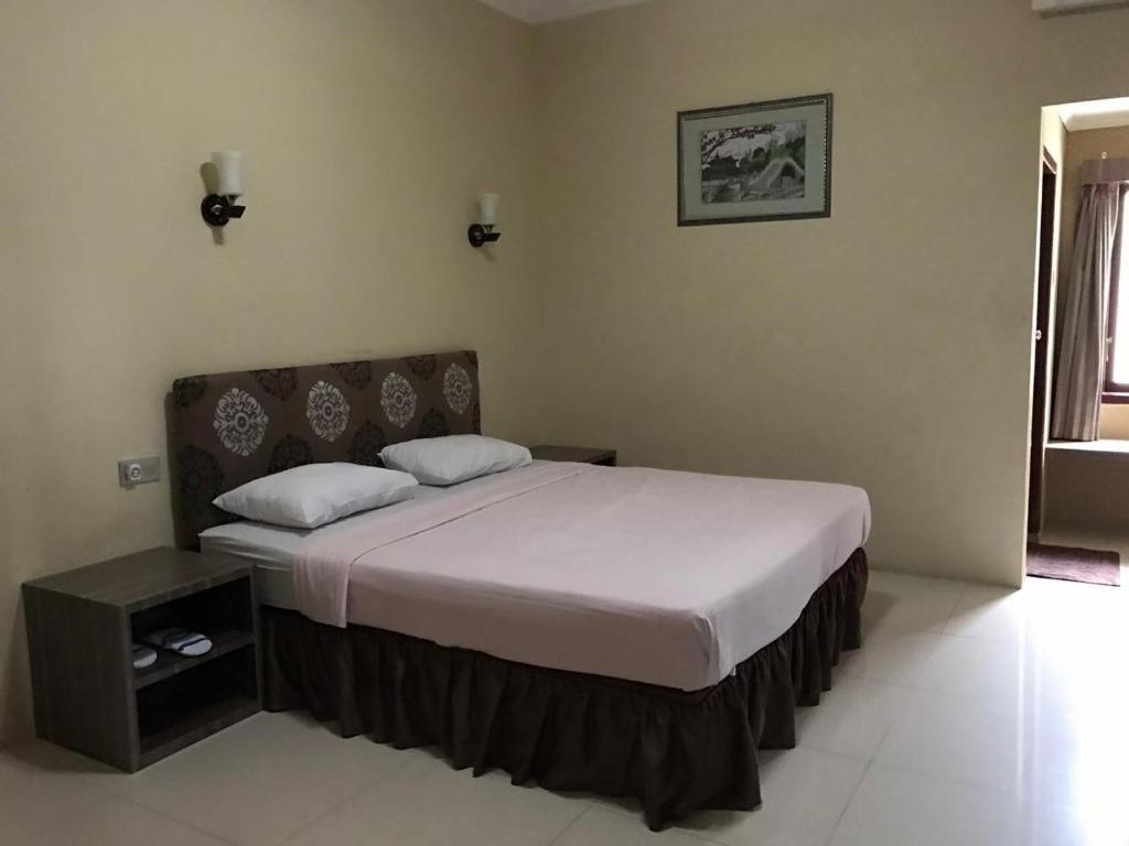Postel nebo postele na pokoji v ubytování Anoi Itam Resort