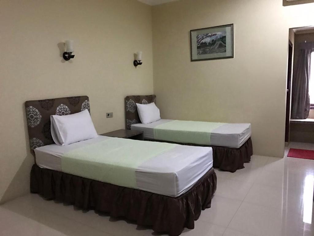 Postel nebo postele na pokoji v ubytování Anoi Itam Resort