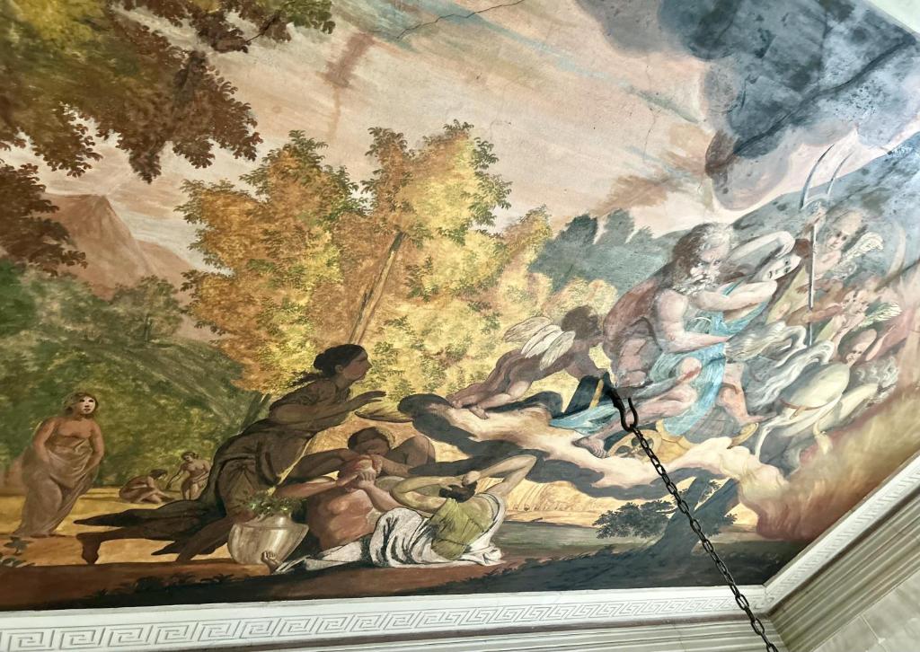 a painting on the ceiling of a room at Mario Number 8 in Verona