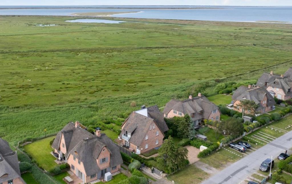 an aerial view of a house in a field at Listend Blick in List