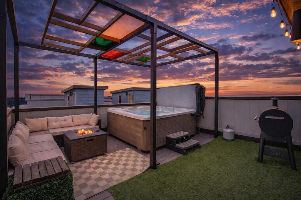a hot tub on the roof of a house at Spacious Denver Home with Private Rooftop Spa in Denver