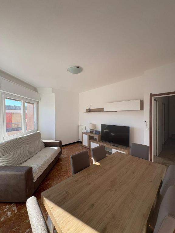 a living room with a couch and a table at Casa Francesco in Rapallo