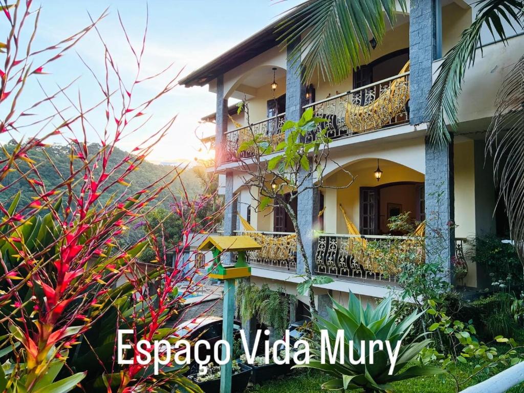 a view of the exterior of an apartment building at Espaço Vida Mury - Casa Mara in Nova Friburgo