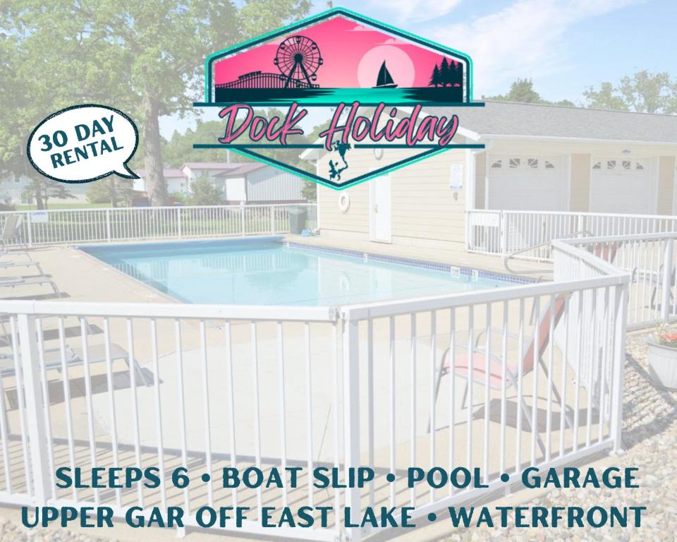 a pool with a sign for a pool facility at 84 Rohr 7B in Arnolds Park