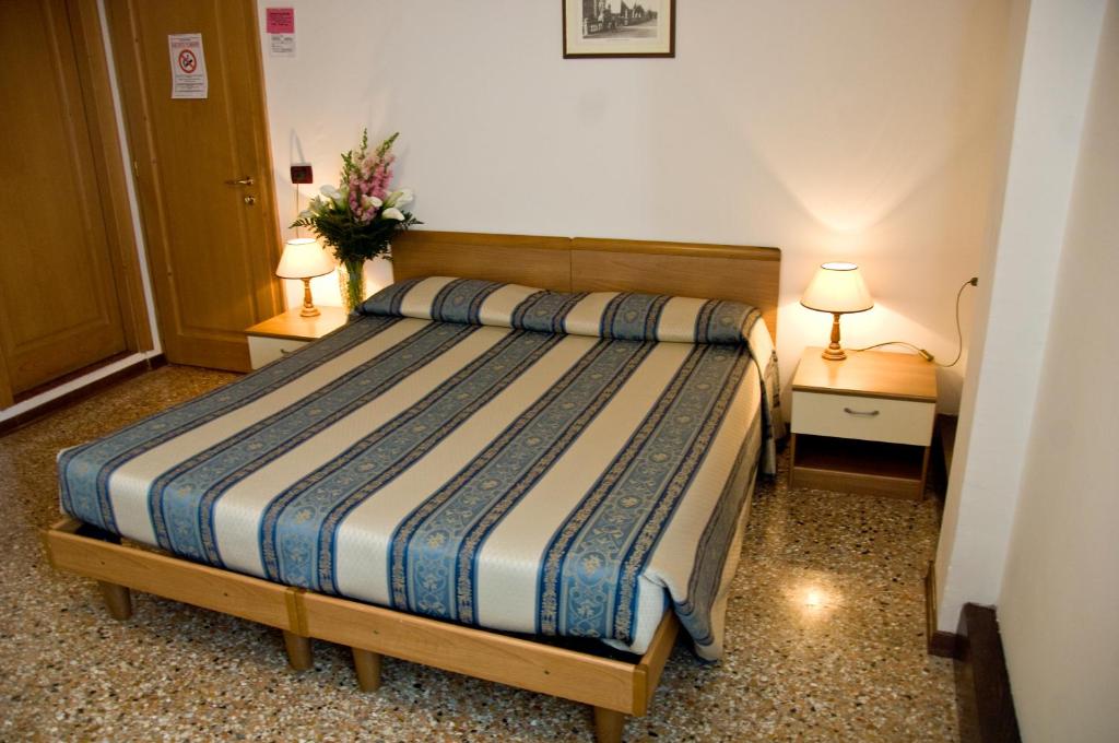 Postel nebo postele na pokoji v ubytování Casa Sant'Andrea