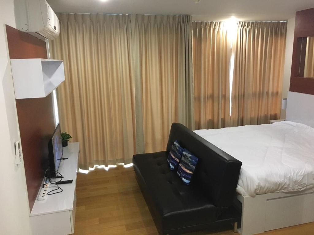 Postel nebo postele na pokoji v ubytování Baan View Viman 416 By Montri
