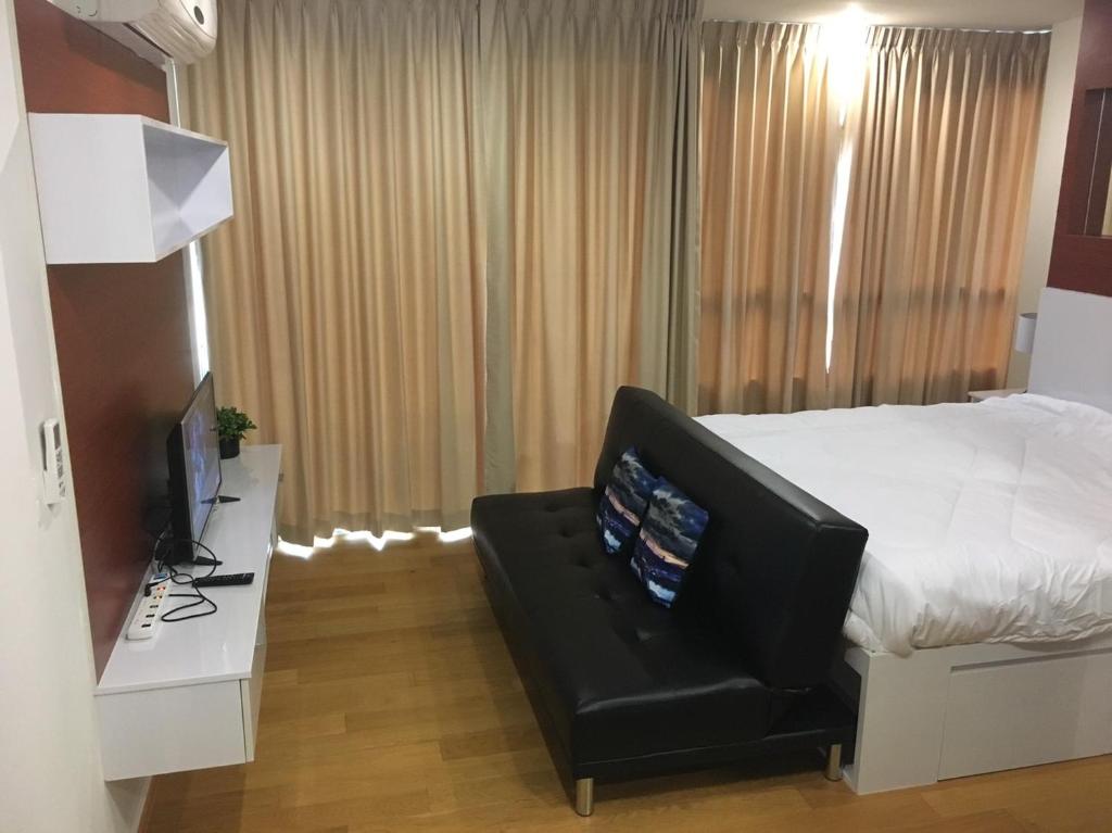 Postel nebo postele na pokoji v ubytování Baan View Viman 416 By Montri