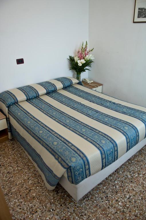 Postel nebo postele na pokoji v ubytování Casa Sant'Andrea