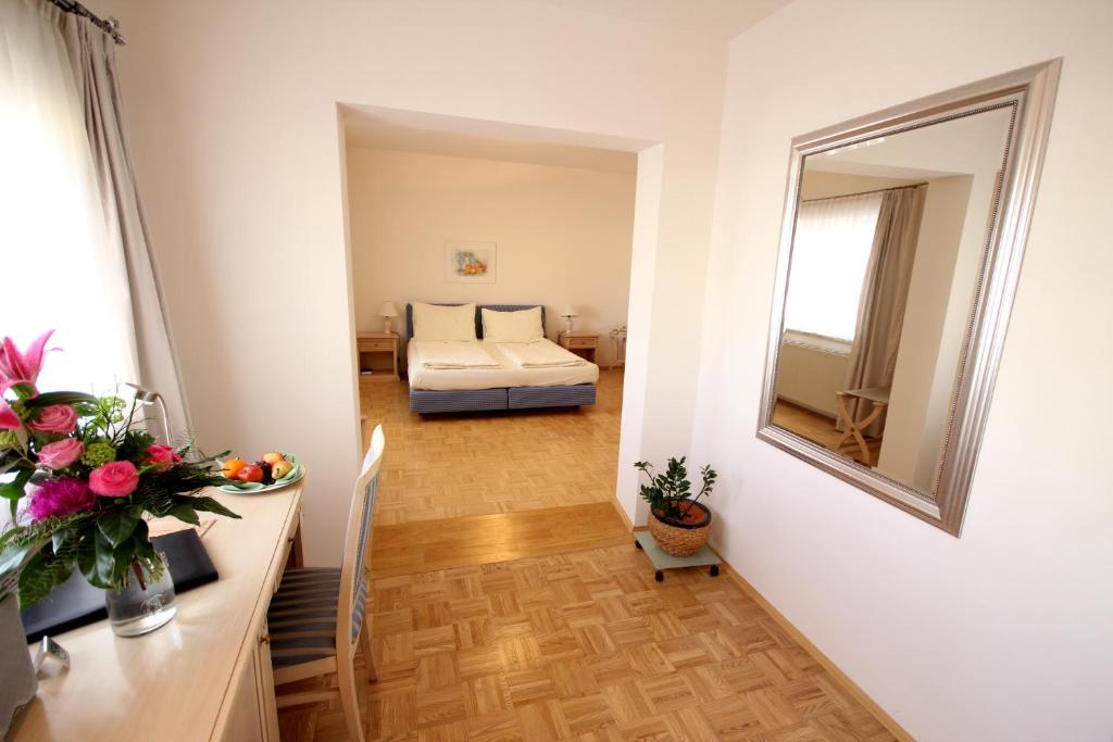 Posteľ alebo postele v izbe v ubytovaní Carinthia Stadthotel