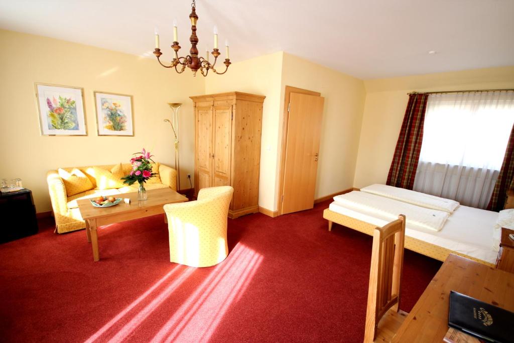 Posteľ alebo postele v izbe v ubytovaní Carinthia Stadthotel