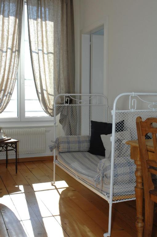 Postel nebo postele na pokoji v ubytování Auberge de la Gare