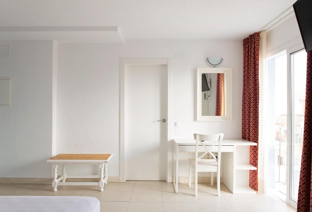 TV a/nebo společenská místnost v ubytování Hotel Eliseos