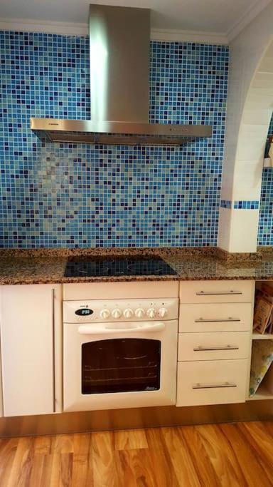 A kitchen or kitchenette at Brisa del Mar
