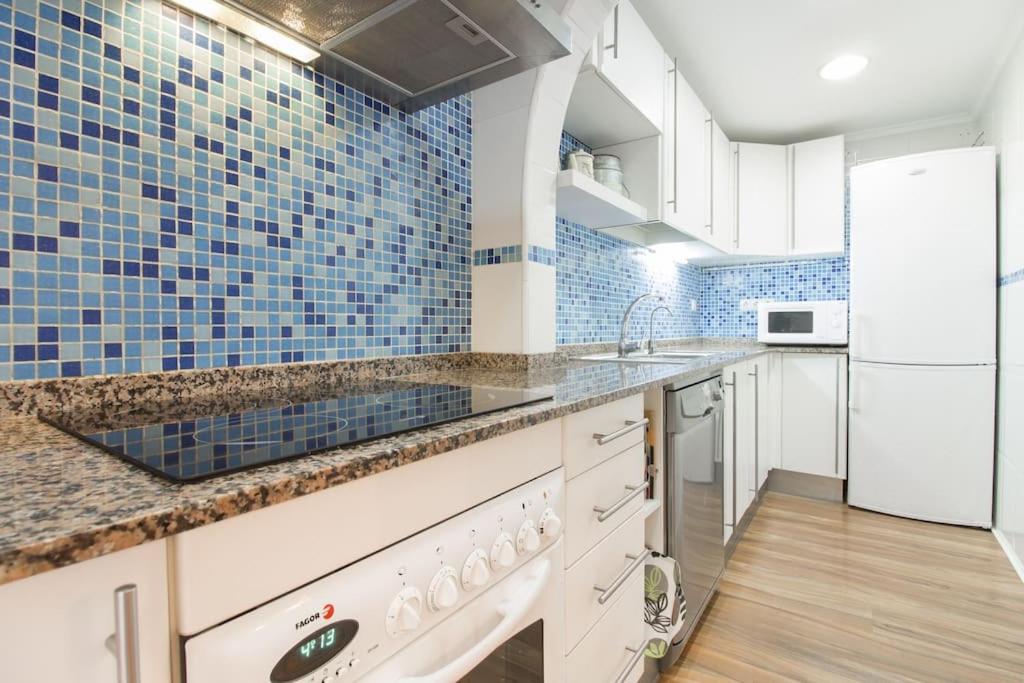 A kitchen or kitchenette at Brisa del Mar