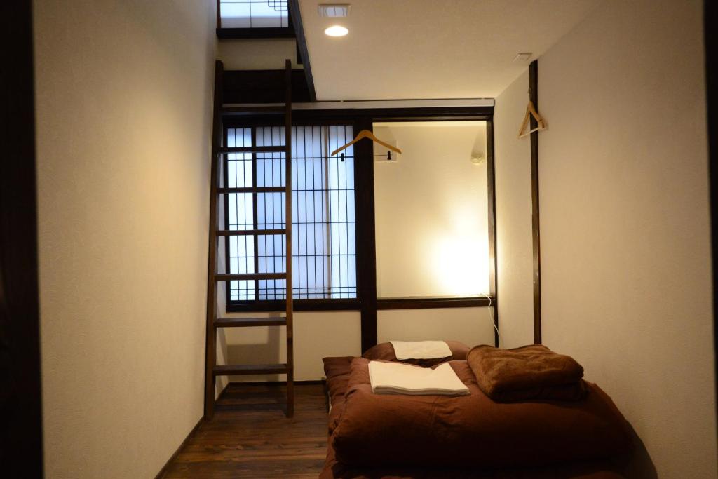 Postel nebo postele na pokoji v ubytování Guest House KuKu