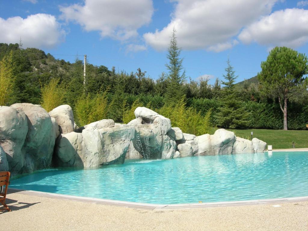 Bazén v ubytování Hotel Le Grotte nebo v jeho okolí