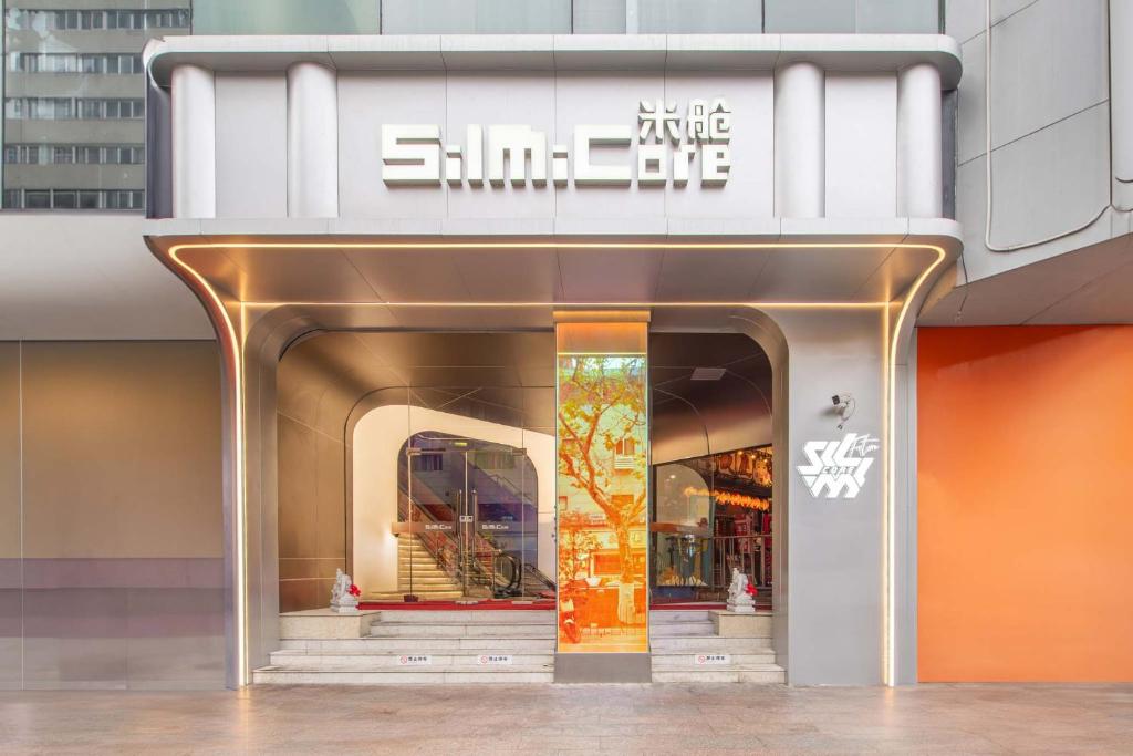 a store front of a shopping center with a door at SilMiCore Hostel in Shanghai