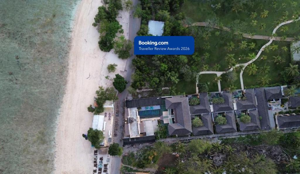 an aerial view of a villa on a beach at The Trawangan Resort in Gili Trawangan