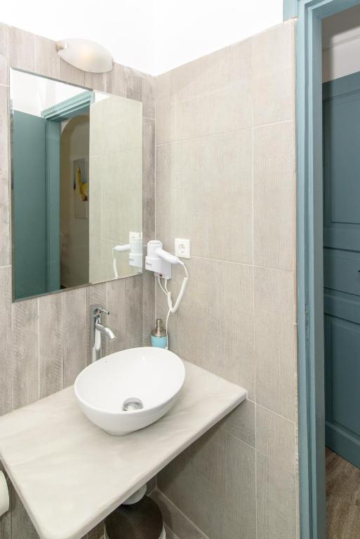 Koupelna v ubytování Iris Boutique Hotel