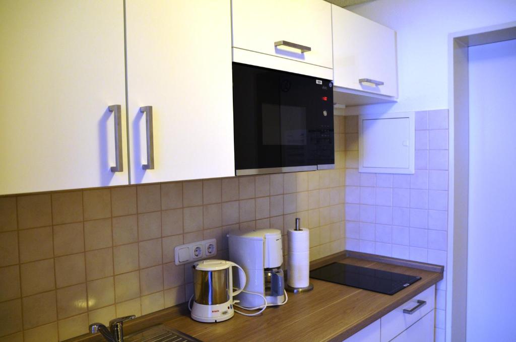 Kuchyň nebo kuchyňský kout v ubytování Gästehaus Pauline