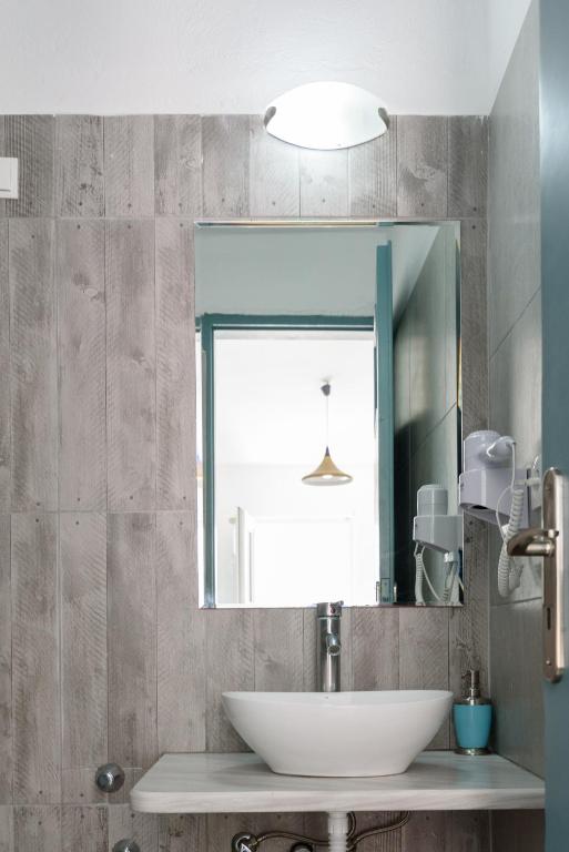 Koupelna v ubytování Iris Boutique Hotel