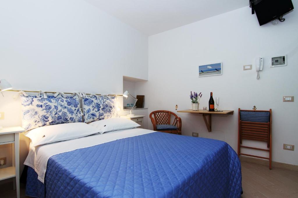 Postel nebo postele na pokoji v ubytování SoleMare