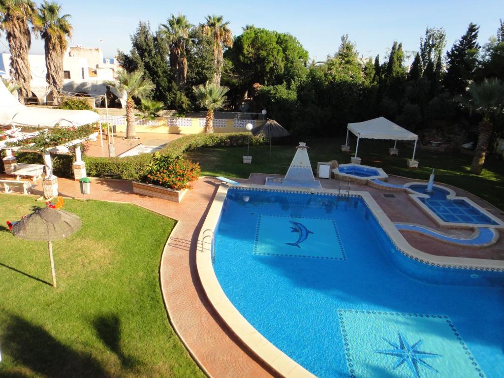 an overhead view of a swimming pool in a yard at Bertur San Antonio Mar in Alcossebre