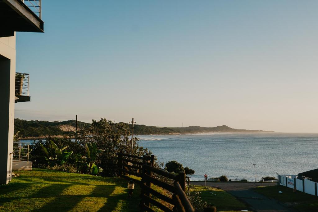 a view of the ocean from a house at Seaside tranquility in Gonubie in East London
