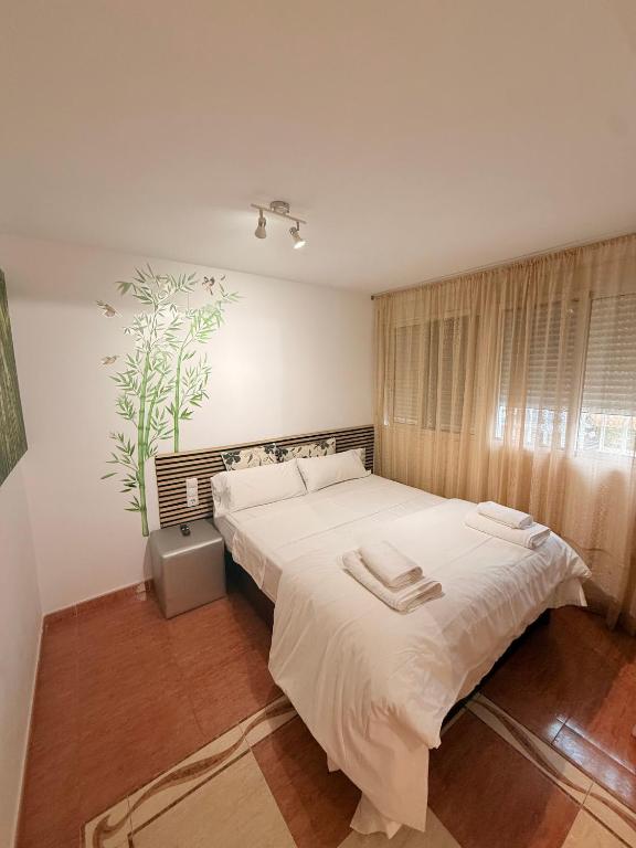 Habitaciones estudios con cocina y baño privado de temporada Instancias largas Long Stay desde 11 noches