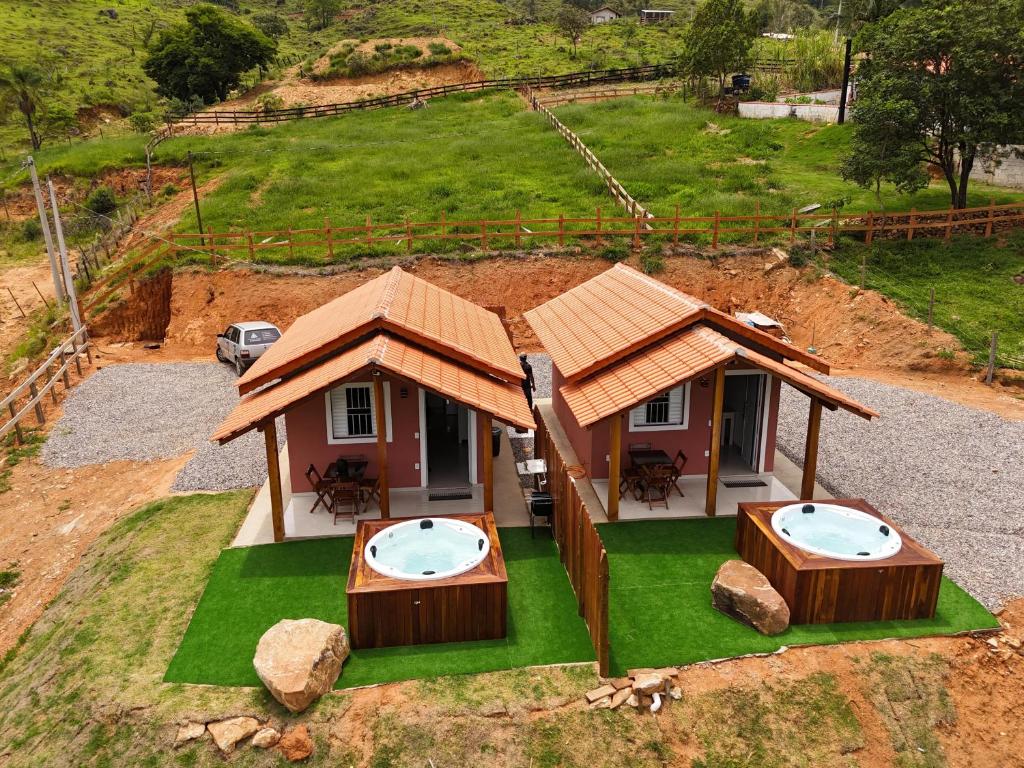 an aerial view of a house with a roof at Chalés São Pedro in Socorro