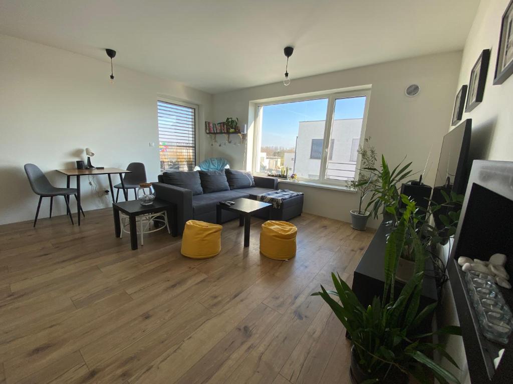 a living room with a couch and a table at Apartment Nina in Hrubá Borša