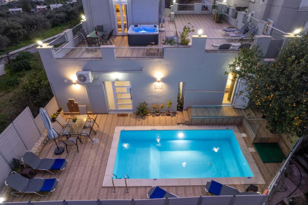 an overhead view of a house with a swimming pool at Vista Magica in Chania