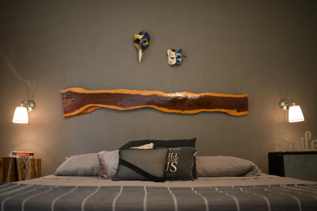 Postel nebo postele na pokoji v ubytování Tamarindo Sunshine