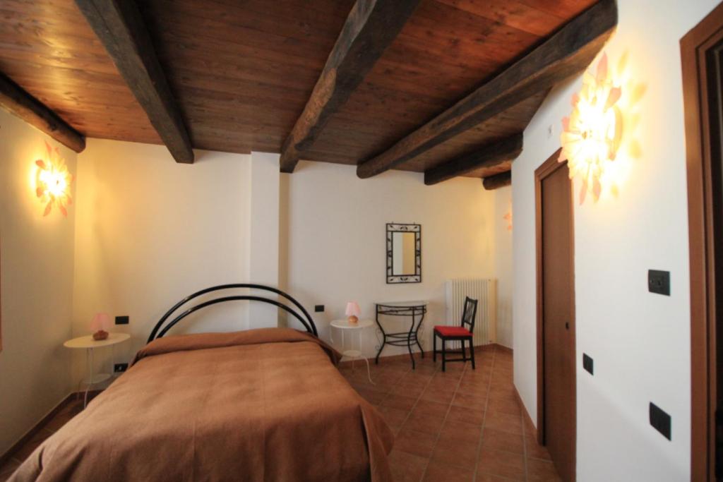 Postel nebo postele na pokoji v ubytování Agriturismo Davide