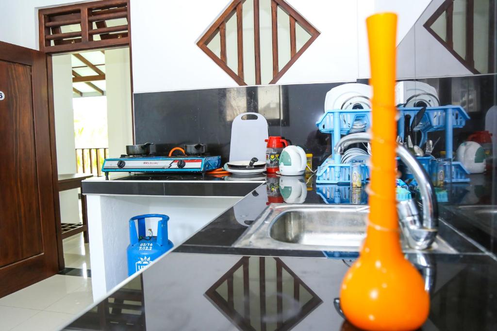 Kuchyň nebo kuchyňský kout v ubytování Tinara River Inn, Weligama