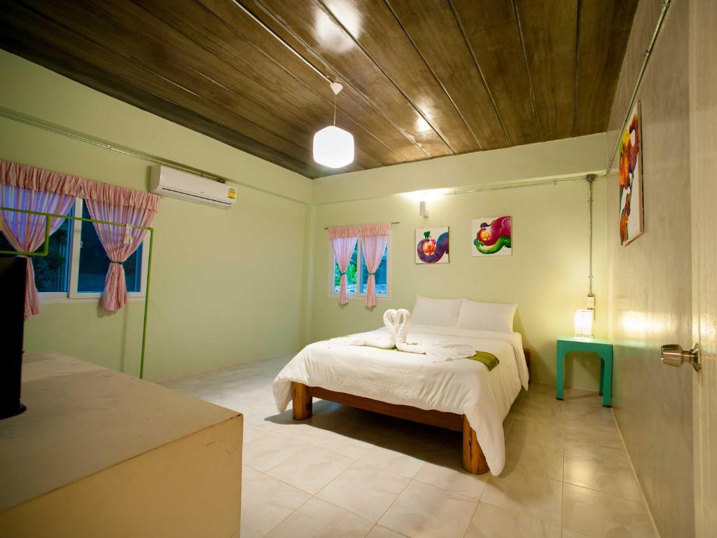Postel nebo postele na pokoji v ubytování Baan Chokdee Pai Resort