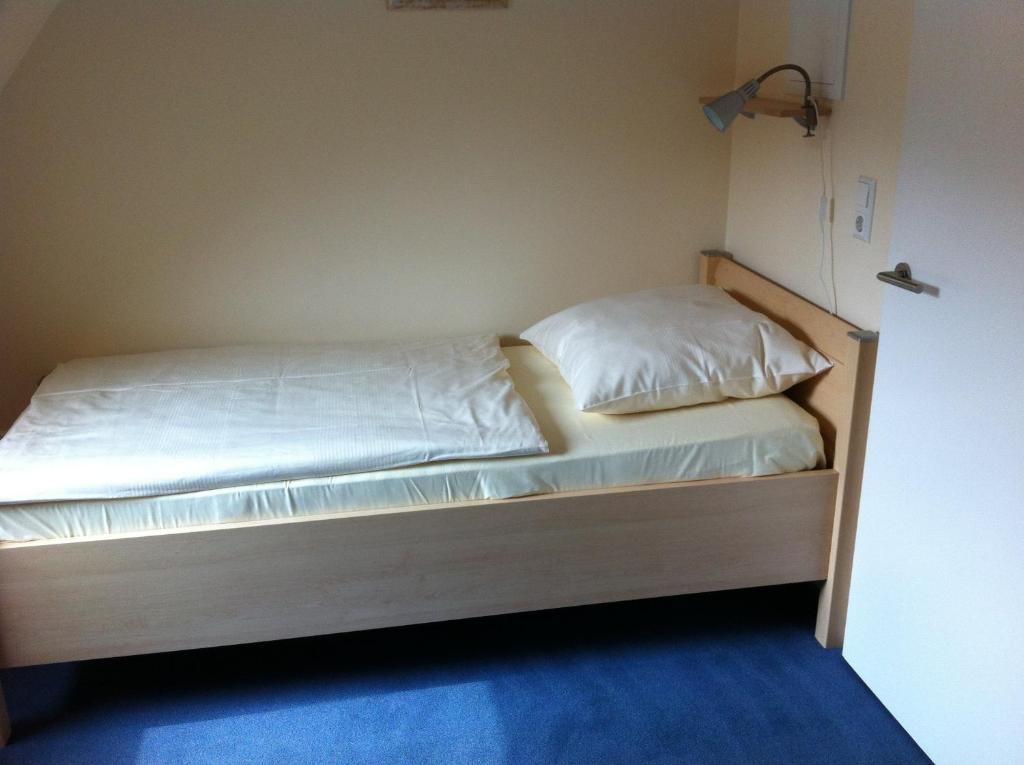 Postel nebo postele na pokoji v ubytování Hotel Appart