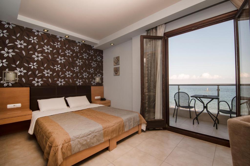 Postel nebo postele na pokoji v ubytování Mistral Hotel